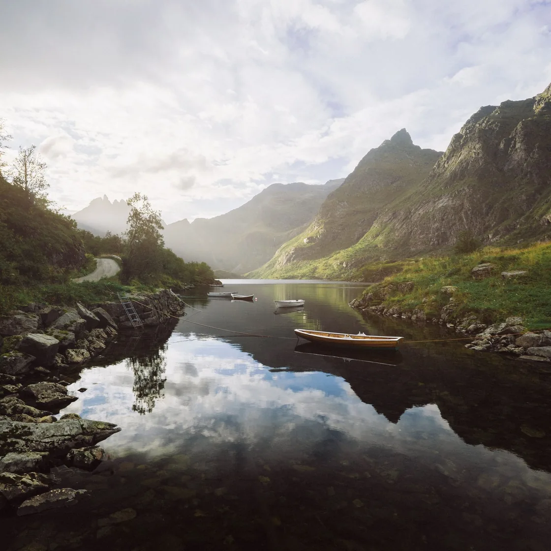Mountain peaks reflected in a still body of water